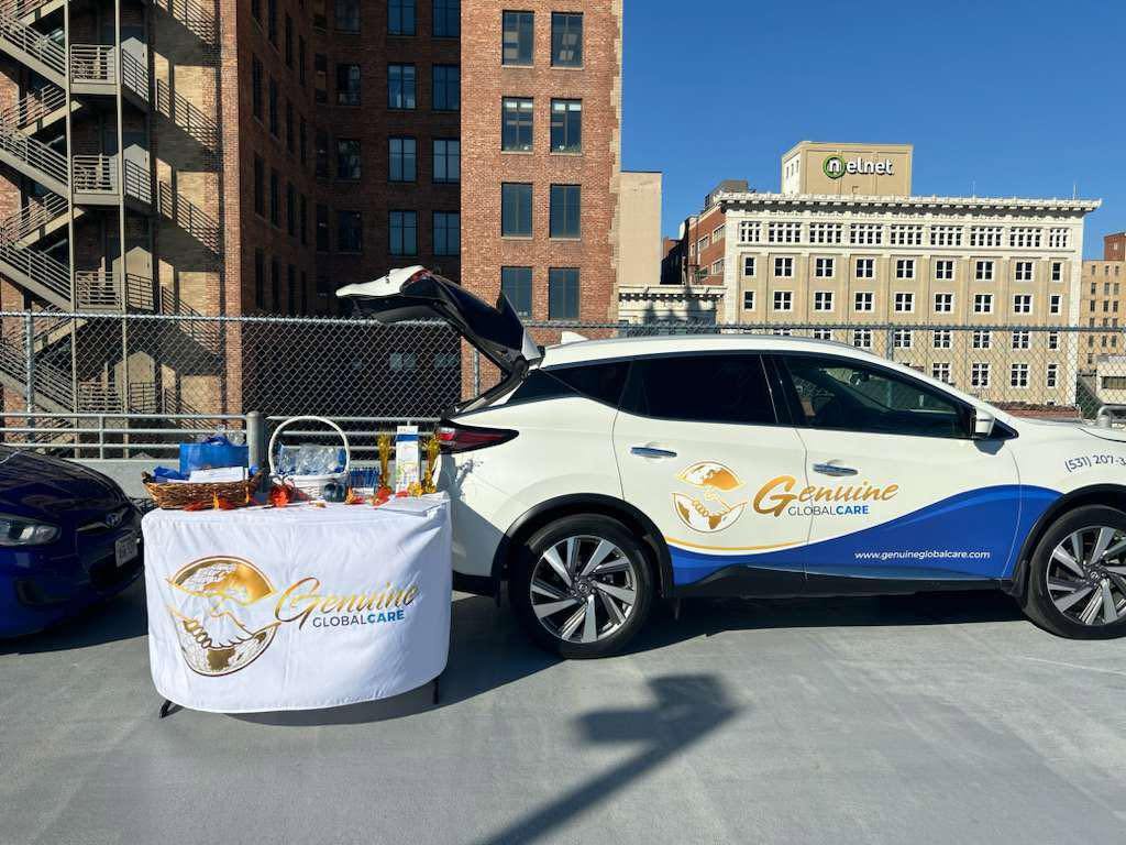 Genuine Global Care branded vehicle at a community event